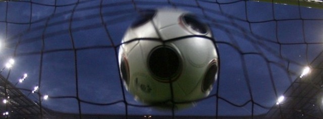 Germany's Podolski scores past Poland's goalkeeper Boruc during Group B Euro 2008 match in Klagenfurt